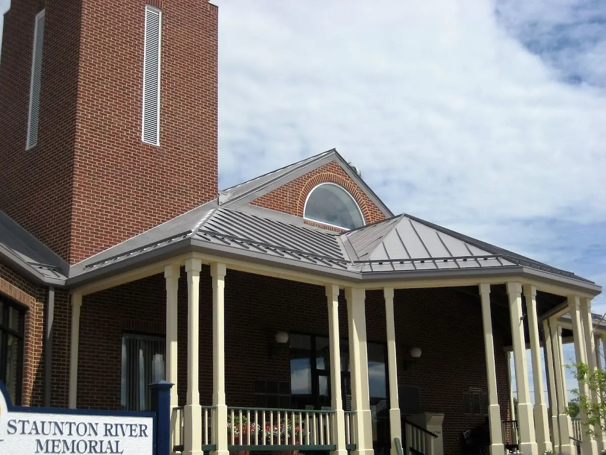 Skilled roofing craftsmen working on a residential roof in Garden City